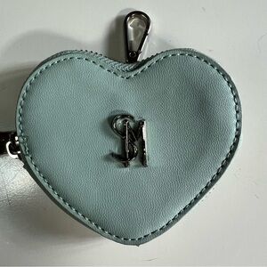 NWOT Steve Madden Frosty Green Coin Pouch. Plastic protector still on zipper tab